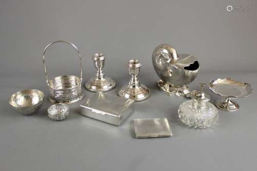 Miscellaneous Silver and Silver Plate, including a silver cigarette case Birmingham hallmark, mm W N Ltd, Mappin & Webb spoon warmer in the form of a shell, cut-glass atomizer, cigarette case, cruet, candlesticks, bon bon dish, bon bon basket