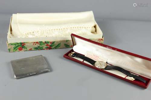 A Gentleman's Lot, including Marvin Automatic Incabloc Wrist Watch, the watch having a pearl-finish face with baton dial and date aperture, on black leather strap in the original box; a silver cigarette case Birmingham hallmark, mm Adie Bros Ltd, approx 138 gms, together with a cream evening dress scarf