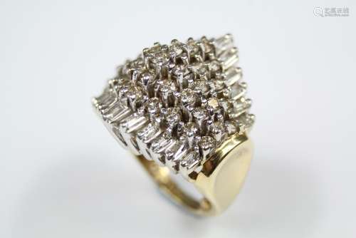 A Lady's 14ct Yellow Gold and Diamond Cocktail Ring, the ring set with 22 baguette-cut dias approx 90 pts and 1