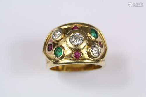 A Bespoke 18ct Yellow Gold Diamond, Emerald and Ruby Ring, the ring set with approx 1 x 30 pts; 2 x 20 pts, two emeralds approx 2