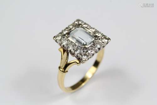 An 18ct Yellow Gold Diamond and Aquamarine Ring