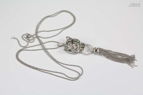 A Cartier-Style Silver Leopard Head Pendant and Silver Beaded Chain, the chain approx 78 cms, , pendant drop 9 cms, total approx 19