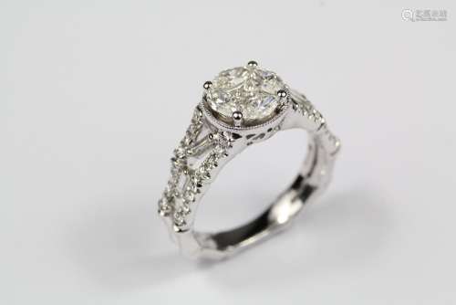 An 18ct White Gold Diamond Ring, the ring set with four princess-cut diamonds approx 25 pts, surrounded layered with four marquise-cut diamonds approx 60 pts and having approx 40 pts of baguette-cut dias and approx 48 pts of round-cut diamonds to shoulders, size M, approx 6 gms, on a bamboo-design shank