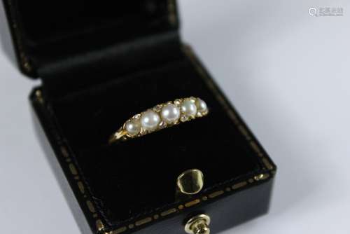 Antique 18ct Yellow Gold, Pearl and Diamond Ring; the ring set with five pearls, approx pts of dias, size P, approx 2