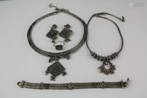 A Vintage Syrian Woven Silver Necklace, Bracelet, Earrings and Ring Set, the necklace approx 35 cms, bracelet 15 cms together with another silver beaded necklace approx 35 cms