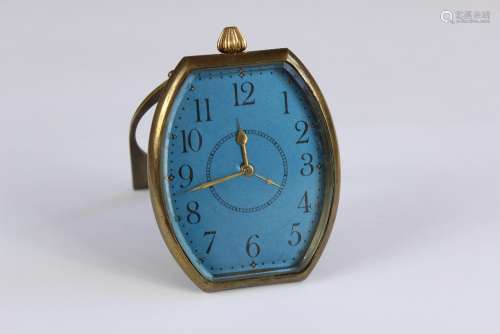 A Septime Brass Watch Company 15 Jewel Bedside Clock, the clock having a blue face with numeric dial, approx 7 x 8 cms, with brass easel support