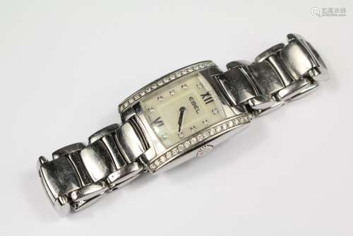 A Lady's Ebel Brasilia Wrist Watch, the stainless steel watching having a diamond studded mother of pearl face with diamond border to case, case nr E9976M2S A100088, the watch having a concealed clasp, in the original leather box