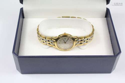 A Lady's Two-Tone Eterna Automatic Wrist Watch, the watch having a silver dial with baton numerals and date aperture, on stainless steel concealed clasp, complete with the original box, booklet and purchase certificate