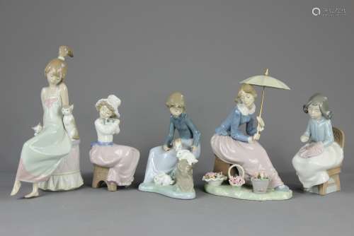 Nao Porcelain Figurines, this lot includes five figurines including 'Girl with Umbrella', 'Girl with Rabbits', 'Girl with Puppies', 'Girl Embroidering' together with a Lladro figurine 'Girl with Kittens', approx 26 cms h