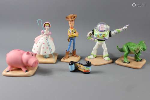 Walt Disney Porcelain Toy Story Characters, figures include Bo-Peep 'I found my moving partner'; Ham 'It's Showtime'; Rex I'm so glad you're not a Dinosaur'; Woody 'I'm Still Andy's Favourite Toy'; Buzz Lightyear 'To Infinity and Beyond', together with an opening title reel, complete with the original boxes, x6