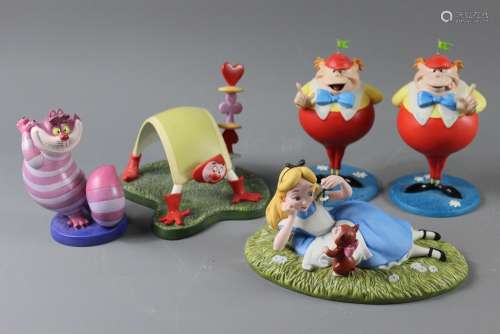 Walt Disney Porcelain 'Alice in Wonderland' Characters, figures include Alice & Dinah 'Riverbank Reverie'; Twiddle Dee & Twiddle Dum 'Riddles and Rhymes' and Puzzles and Poems'; Cheshire Cat 'Surreal Smile' and the Playing Card 'Card Painter', complete with the original boxes