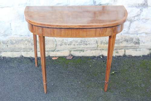 An Antique Mahogany Card Table; the table measures approx 91 x 87 x 74 cms (open), the interior covered in blue baize, having tapered legs