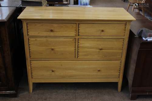 A Wills & Gambier Light Oak Chest of Drawers; the chest having four short and one long drawer, approx 111 x 48 x 89 cms