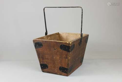 A Wooden Trug; the trug has a wooden base, metal handle and bands to corners, approx 36 x 25 cms