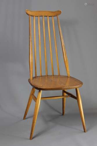 Three Ercol Dining Room Chairs; the spindle back chairs, stretchers and tapered legs (3)