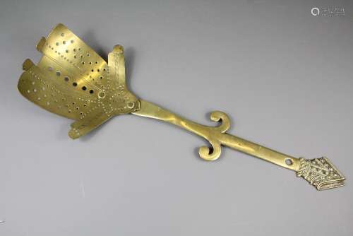 A 19th Century Brass Skimmer, the skimmer having a finial shaped as a mitre