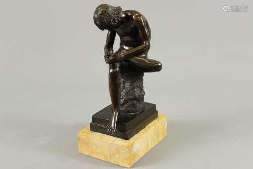 Bronze Sculpture 'Boy with Thorn' after the classic Greek sculpture Spinaro and the later example by Hubert Le Sueur, supported on a marble base