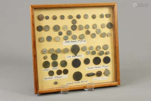 Archaeological Finds - Local Interest, a framed box of 17th and 18th Century lead tokens, lead bag seals, 17th Century jettons, 17th century trade tokens, three pilgrim brooches, George III Cartwheel Penny 1797