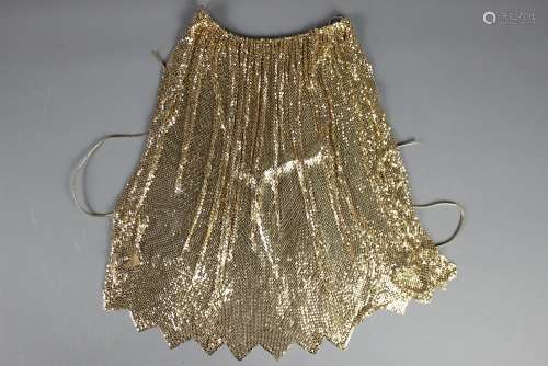 Vintage Whiting & Davis Mesh Halter Top, originally purchased from Saks 5th Avenue together with a gold-tone elasticated belt with floral buckle