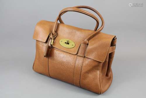 A Mulberry Light Tan Leather Lady's Handbag; the handbag having double handles with leather strap trim, approx 36 x 26 cms, in the original felt dust cover