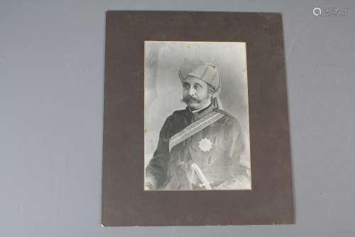 Two Vintage Prints, depicting Prime Minister of Hyderabad, Sir Asman Jah after a sepia photograph taken in 1887; the second depicting Maharajah of Benar after a sepia photograph taken in 1876, together with a brown leather album with some sepia photo-prints of Indian nobility, approx 45 images in total