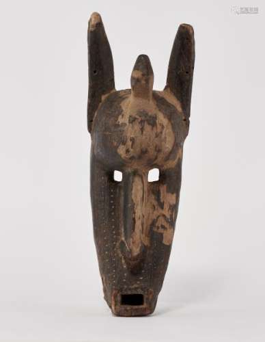 Bambara (Mali), masque hyène - Bois à patine brune et plus clair, H 43 cm -