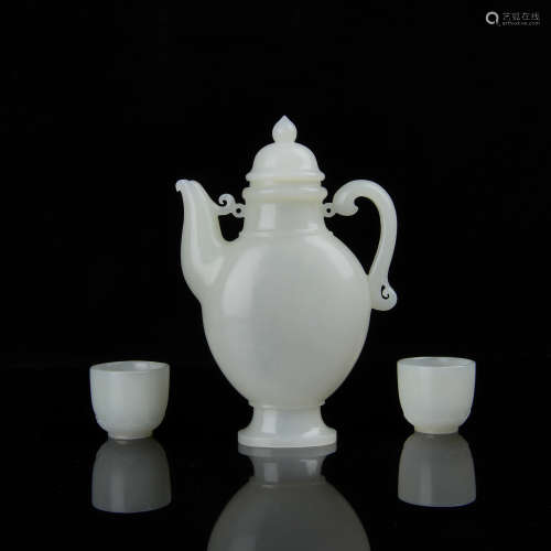 A Chinese Carved Jade Tea Pot with Two Cups