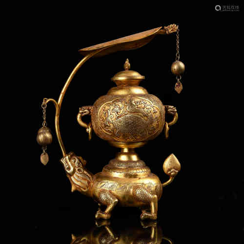 A Chinese Gilt Bronze Lamp