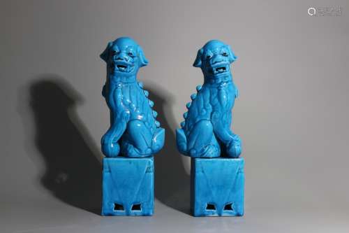 A Pair of Chinese Lapis-Lazuli-Blue Glazed Porcelain Foo-Dogs