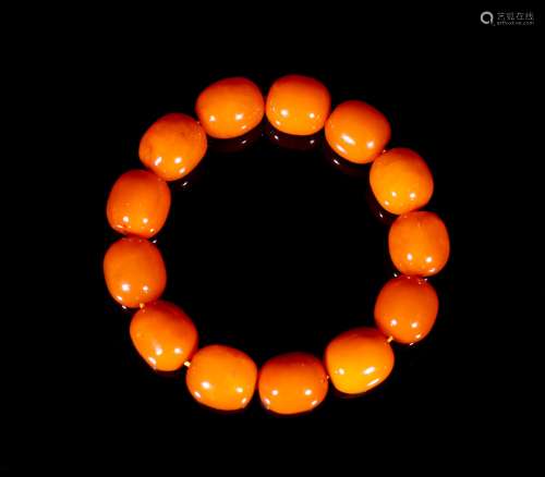A Chinese Carved Amber Bracelet