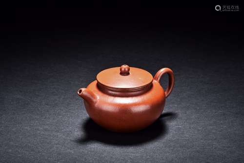 A YIXING RED CLAY TEAPOT