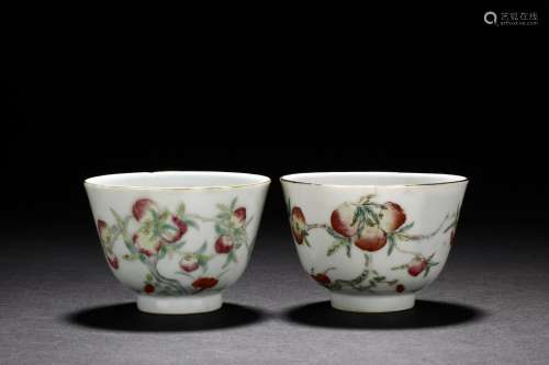 A PAIR OF FAMILLE ROSE 'NINE PEACHES' CUPS