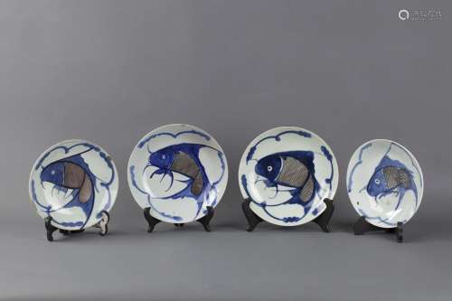 A SET OF FOUR BLUE AND WHITE 'CARP' DISHES