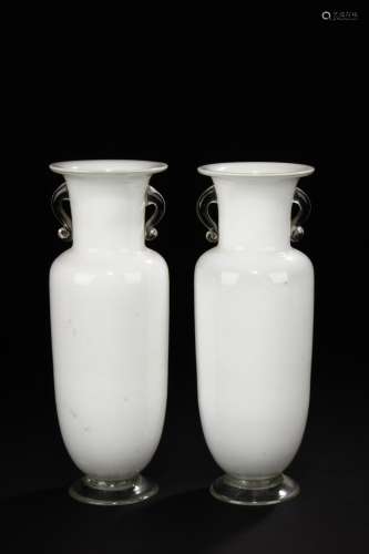 A PAIR OF WHITE AND CLEAR GLASS ROULEAU BOTTLES