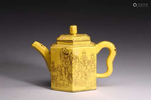 A YELLOW-GLAZED 'EIGHT IMMORTALS' YIXING TEAPOT