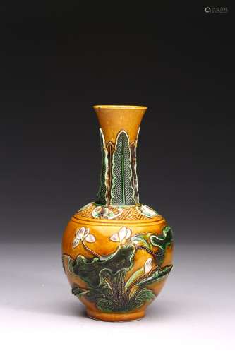A YELLOW GLAZE CARVED 'LOTUS' VASE