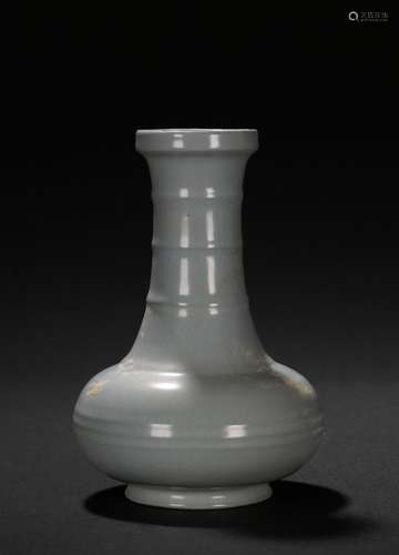 A CELADON GLAZED VASE