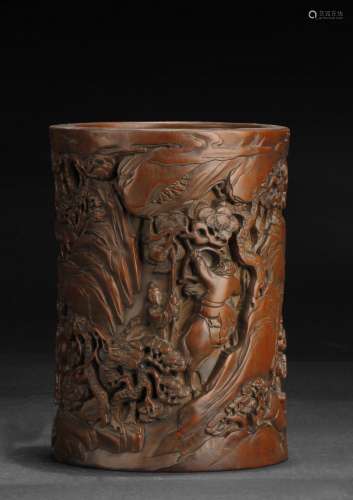 A CARVED HARDWOOD BRUSH POT