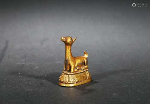 A GILT BRONZE STATUE OF DEER