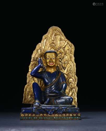 A LAPIS LAZULI CARVED FIGURE OF MILAREPA