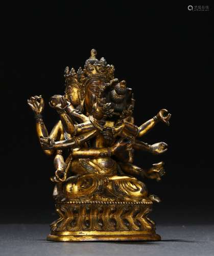 A GILT BRONZE FIGURE OF GUHYASAMAJA