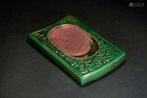 A CARVED GREEN GLAZE INKSTONE