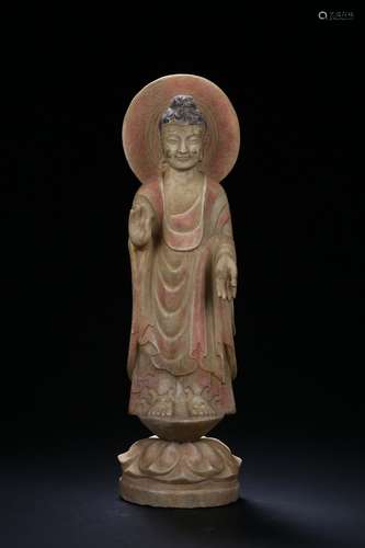 A MARBLE CARVED STANDING BUDDHA STATUE