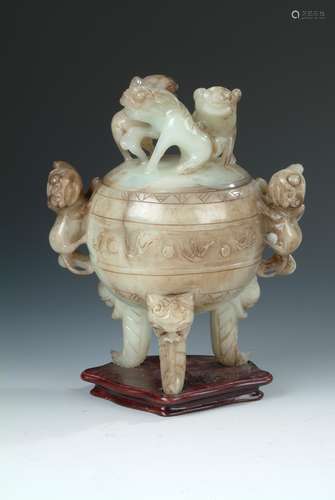 A CARVED 'MYTHICAL BEASTS' JADE TRIPOD CENSER