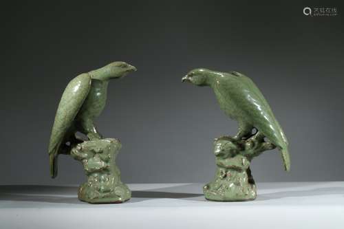 A PAIR OF CELADON GLAZED BIRD MODELS