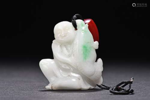 A JADEITE PENDANT OF BOY AND FISH