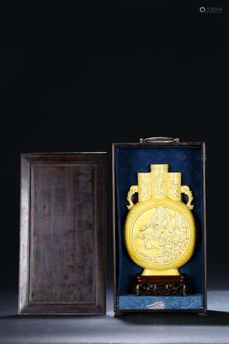 A YELLOW-GLAZED CARVED 'LANDSCAPE' MOON FLASK