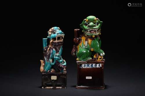 TWO SANCAI GLAZED LION FIGURES