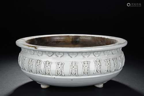 A WHITE-GLAZED TRIPOD CENSER