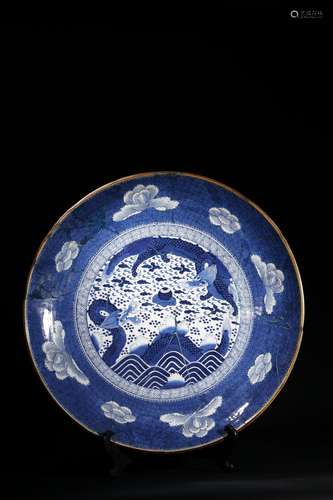 A LARGE BLUE AND WHITE 'DRAGON' DISH